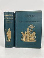 Two volumes upright showing front covers and spines