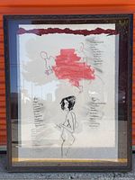 Full view of framed mixed media artwork showing line drawings, red paint wash, and handwritten text on Mylar and paper.