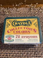 Top of the Crayola Collector's Colors 72 crayon box, showing branding, 'Canadian Edition' and number of crayons including 8 retired colors.
