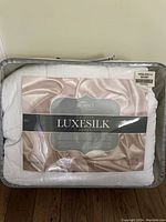King size LuxeSilk duvet in original packaging with brand and product label visible.