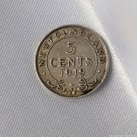 Reverse side of the 1919 Newfoundland 5 cent coin displaying denomination, date, and 'NEWFOUNDLAND' inscription.
