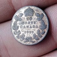 Reverse side of the 1929 Canadian 10 Cents coin showing denomination, year, crown, and wreath.