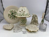 Overview of group showing Lenox and Studio Nova holiday-themed ceramic items and glassware