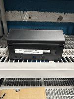 Back view of the black Fujitsu ScanSnap iX500 scanner showing ports and label details.