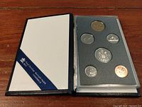 Full view of 1988 Canadian coin set in official Royal Canadian Mint presentation folder showing six coins in foam holder.