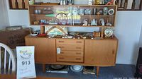 Full front view of sideboard with hutch and surface items
