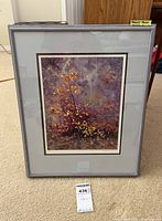Framed print showing the artwork and overall presentation with frame and matting.