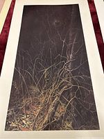 Full view of one 'Dark Encounter' art print showing detailed dark forest imagery with branches and twigs.
