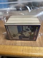 Ziplock bag containing a stack of hockey cards featuring Ray Ferraro card on top