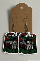 Photo showing front view of a pair of Gremlins dangle earrings attached to a brown card with fishhook backs.