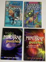 Photo shows 4 puzzle books: Two lateral thinking puzzle books with illustrated covers and two Mind Trap puzzle books by Detective Shadow, all in very good condition with no visible damage.