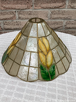 Full view of the vintage cone-shaped lampshade showing pearly white Capiz shells and one of the yellow floral designs.
