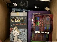 Overhead box view showing The Penelopiad and Cover Her Face