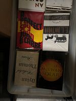 Close-up of some books including A Perfect Spy by John le Carré, Solar by Ian McEwan, Dylan Thomas collected poems.