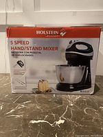 Photo of the Holstein 5 speed hand/stand mixer box showing the product image and features on the front.