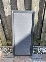 Top view of gray Petsafe dog ramp showing wear and scratches on surface and raised edges