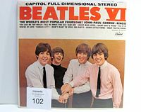 Front cover in shrink wrap with MaxSold sticker