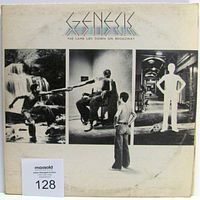 Front cover of Genesis The Lamb Lies Down On Broadway album showing artistic black and white photo montage and album title