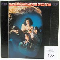 Front of vinyl LP gatefold jacket showing band members and album title with lightly worn edges.