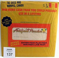 Front view of the yellow original promotional outer jacket for The Guess Who Artificial Paradise LP vinyl record. Shows contest and branding details.