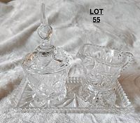 Glass/Crystal cream and sugar set on a tray with pinwheel design, showing all items assembled