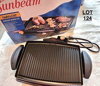 Sunbeam Healthy Chef indoor barbecue grill with box, showing ridged non-stick grill plate, side handles and temperature control attached with electrical cord.