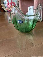 Whole vase showing its shape and color gradient from clear to green with White Crystal label visible.