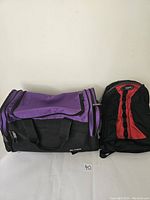 Front view of Everest sports bag and Mount Equipment backpack side by side against white background.