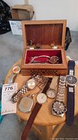 Overall lot: six wristwatches, wooden box with rings, pocket watch, tools