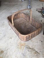 Angled front view showing interior, handle, and overall structure