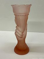 Full view of the vase showing pink ombre satin glass with Lady Liberty torch design.