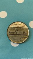 Obverse side of vintage 1862 London International Exhibition medal showing exhibition building and event details.