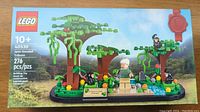 Front box image showing the complete built scene with trees, Jane Goodall figure, and monkeys.