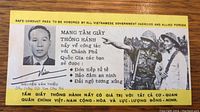 Front side of Vietnam War Safe Conduct Pass showing photo of Nguyen Van Thieu and Vietnamese text with assurance from government agencies