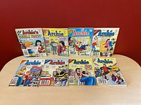 Front view of all 8 Archie Comics Digest magazines with varied covers showing classic characters and colorful comic art.