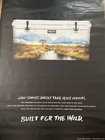 Front view of the banner showing Yeti cooler image and slogan text on a black background.
