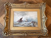 Frontal view of the framed watercolour showing sailing ships and pier