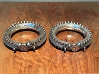 Both bangles side by side on wood surface