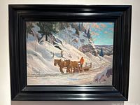 Full frontal view of framed oil painting showing horse-drawn sleigh on snowy road in winter landscape