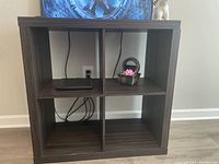 Front angle view of the 4 cubicle stand showing size and compartments.