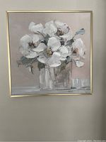 Full view of painting showing white flowers in glass vase with gold frame