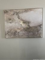 Full frontal view of the abstract wall art painting, showcasing textured neutral tones with metallic flecks and thin metallic framing.