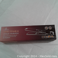Box of Dorisilk Nano Titanium hair straightener showing product name and features