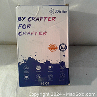 Box exterior showing JDiction brand and product features including non-toxic and low VOC formula, 16 oz size, suitable for crafting.
