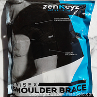 Front view of the Zenkeyz branded shoulder brace packaging showing the product inside the sealed package with key text about interchangeability and build quality.