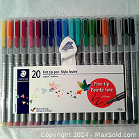 Complete set of 20 STAEDTLER triplus fineliner pens displayed in a plastic storage box, showing all colors clearly.