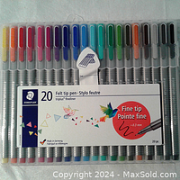 Set of 20 felt tip pens in plastic case showing variety of colors and STAEDTLER labeling.