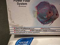 Close-up of Hague Watermax Power Filter System box highlighting filtration rate and compatibility.