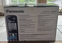 Box front and top showing model number KX-TG6434 and product features including DECT 6.0 technology and answering machine with 18-minute digital recording.
