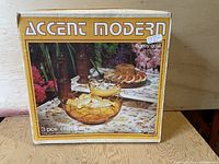 Photo of the original Accent Modern box for a 3 piece chip and dip set in honey gold color.